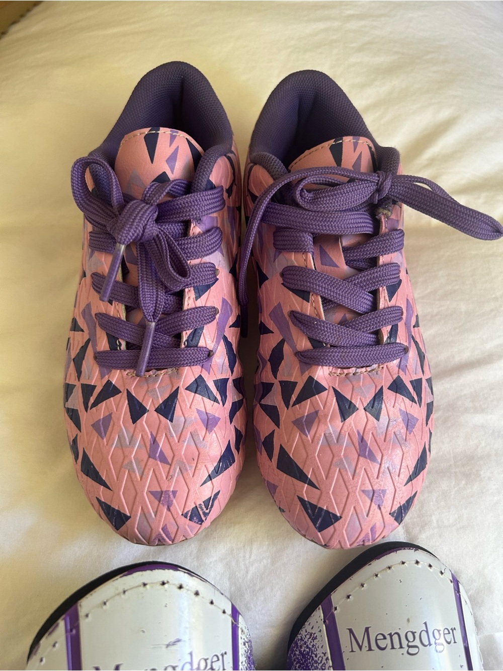 Soccer cleats size 13.5 and shin guards